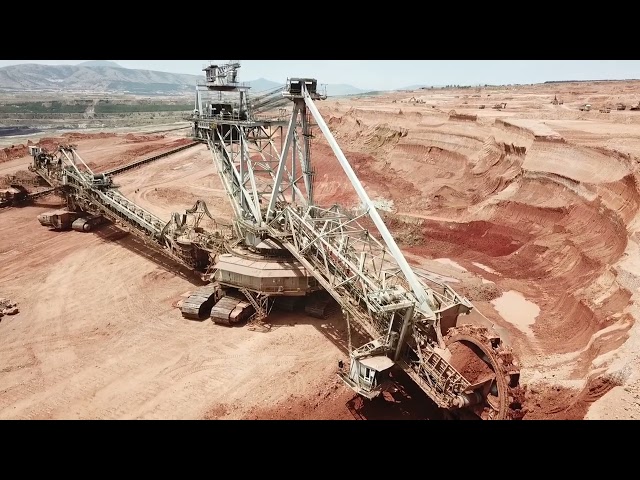 Huge Wheel Bucket Excavator In Action - Aerial View