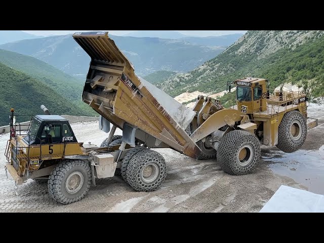 Caterpillar & Komatsu Wheel Loaders Loading Huge Marble Blocks On Dumpers - Birros Marble Quarries