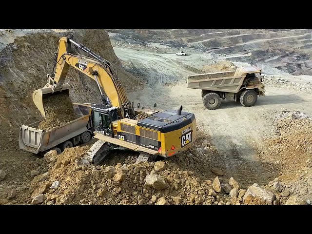 Caterpillar 390D Excavator Loading Mercedes & MAN Trucks - Pyramis Ate