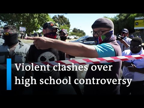 Violent clashes after allegations of racism at South African high school | DW News