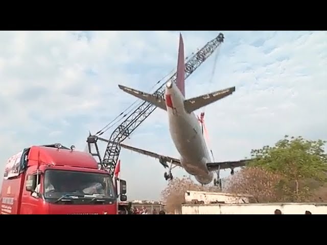 Crane Collapses And Drops Plane