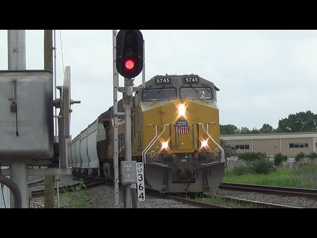UP manifest out of englewood notches up and leaves tower 26 and passes green signal