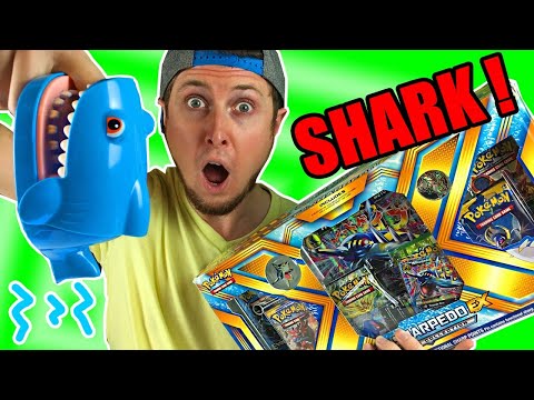 SHARK TRIED TO BITE ME WHILE OPENING POKEMON CARDS COLLECTION BOXES! (Shark Week Edition)