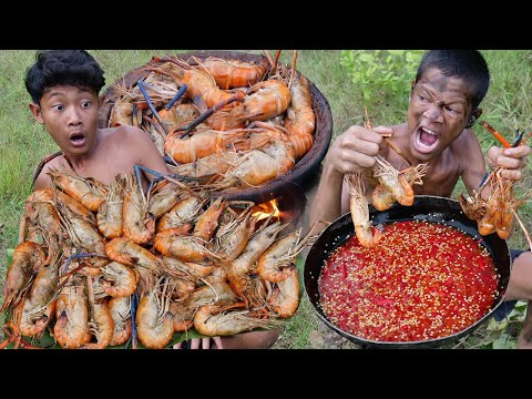Primitive Technology - Cooking lobster on clay pot for food at the forest