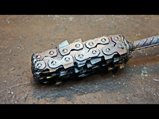 Damascus steel from an old chainsaw chain.