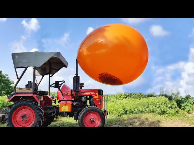 Biggest Monster Balloon VS Tractor - Experiment