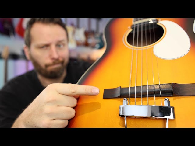 This Guitar has a RUBBER Bridge?? - Playing the Orangewood Juniper!