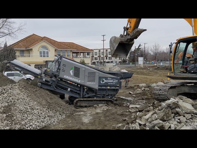 Kelowna's TNT's Crushing it mobile crushing Komplet Krokodile recycling concrete w/rebar & scrap PT2