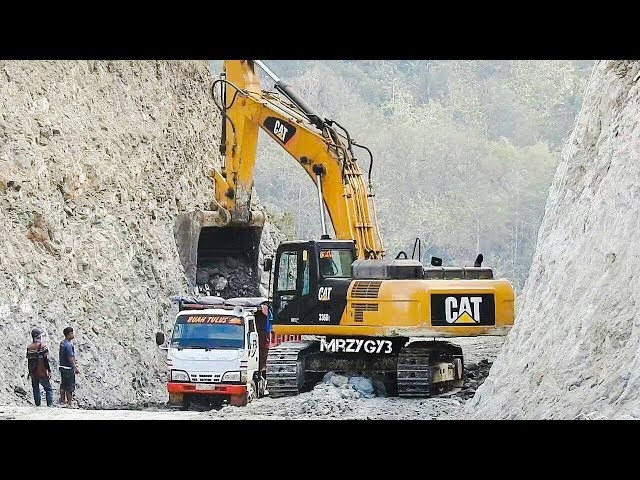 Heavy Equipment Excavator Dump Trucks Work On Road Construction