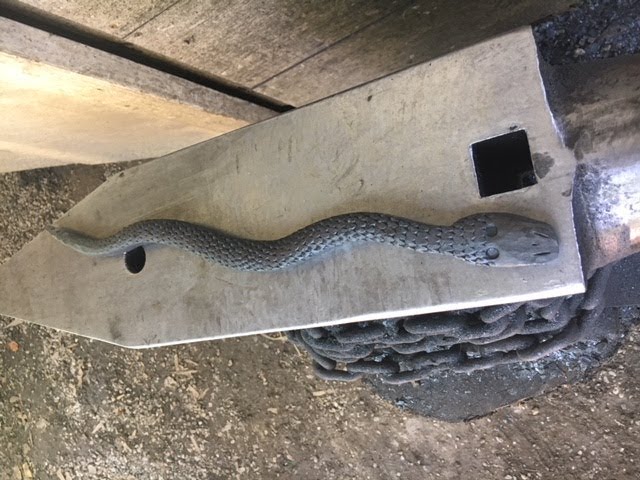 Forging a snake from a wood rasp