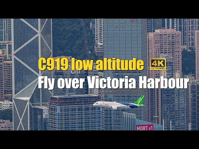 China's C919 aircraft fly over low altitude over Victoria Harbour