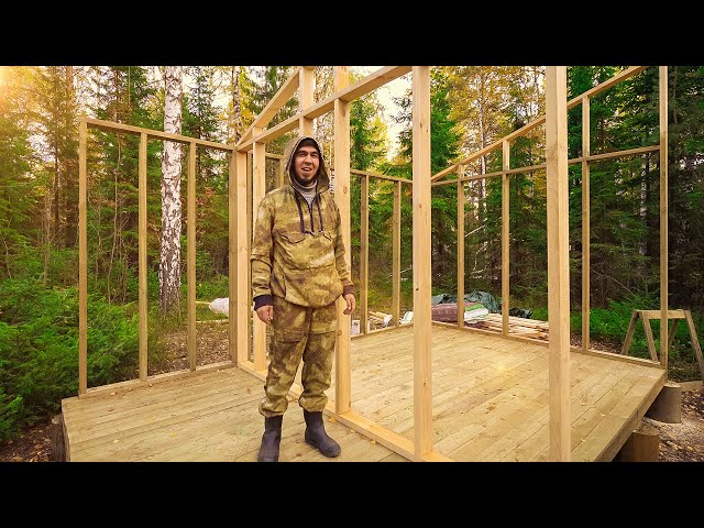 Building a house in the forest. Frame house. Cooking.