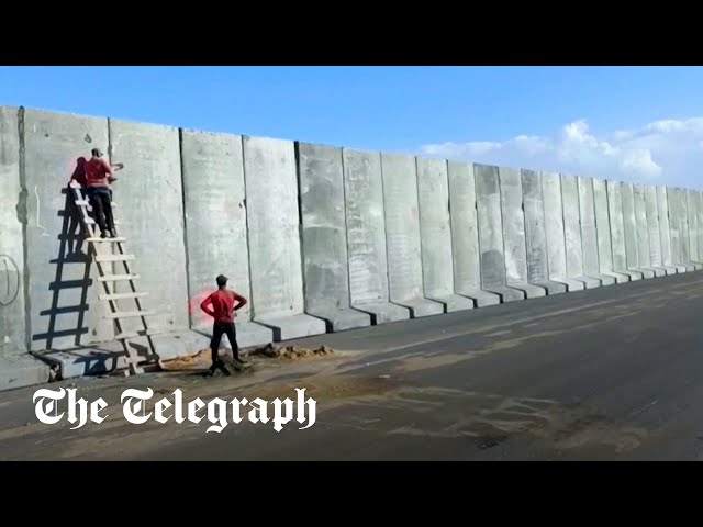 Egypt builds large cement wall at Gaza border, for aid 'logistics zone' officials say