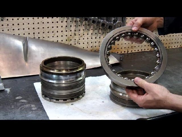 the Thrust Bearing: what holds it in?