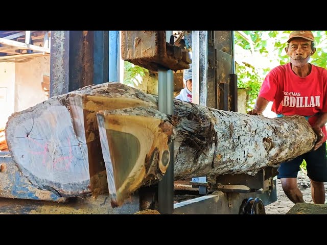The process of making a 7/14 block for door frame material from teak wood