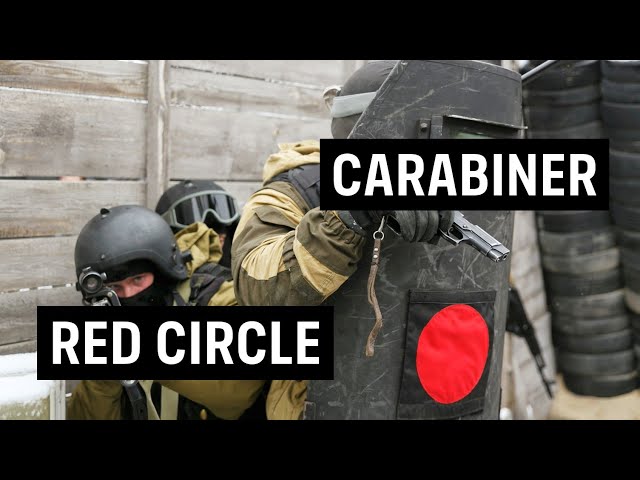 Why do FSB Operators Put a Red Circle on Shields and Hang an Empty Carabiner