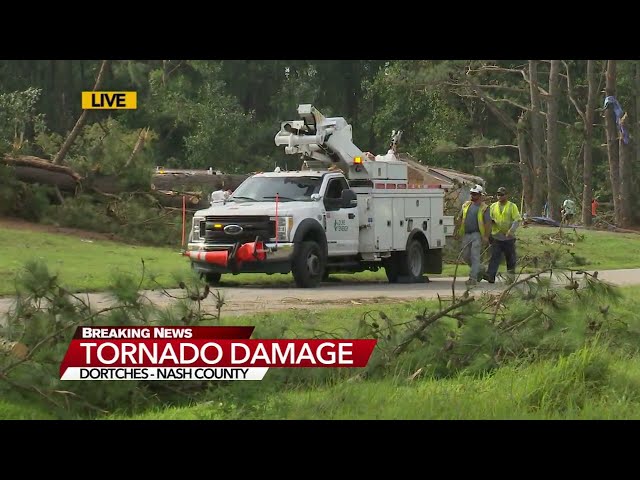 Crews in Dortches work to clean up trees, powerlines to restore power