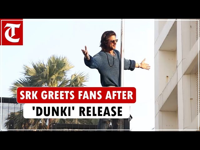 Actor Shah Rukh Khan greets fans with his iconic pose outside Mannat after 'Dunki' release