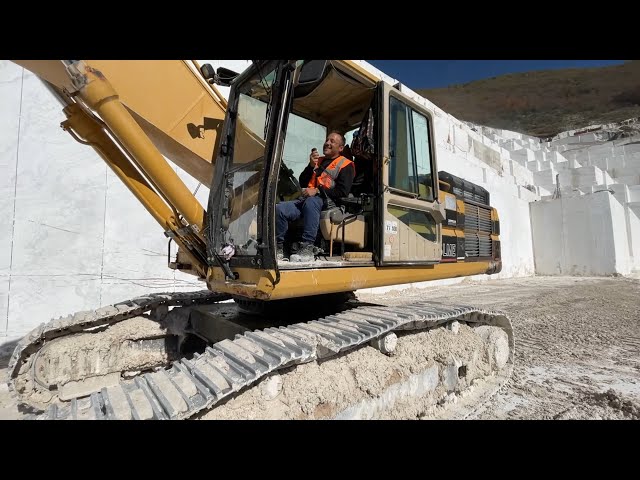 MMC Owner Working With Caterpillar 345B Excavator & Caterpillar 992D - Birros Marbles Quarries