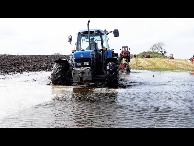 Ford 8340 Plowing in Muddy Field